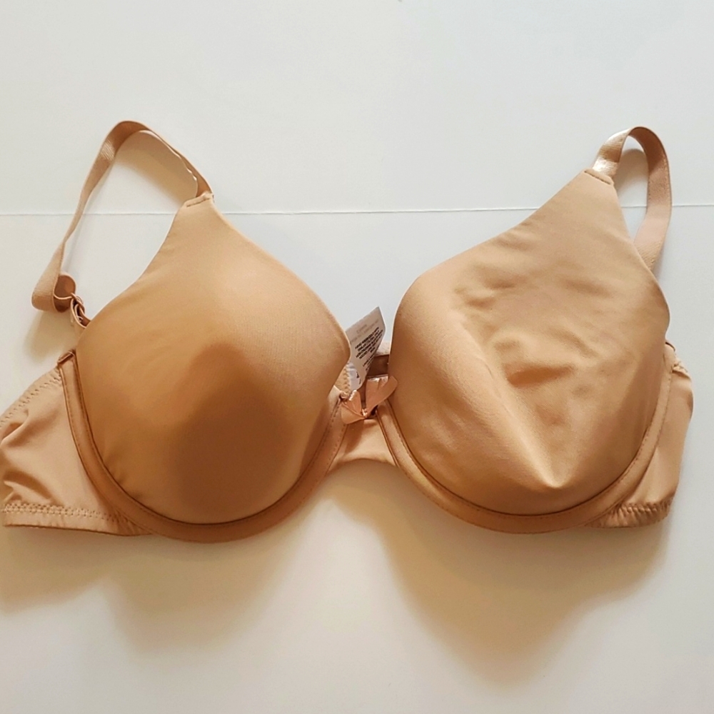 Nude or tan color adjustable strap bra size 38B